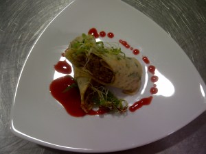 Peking duck in a coriander crepe