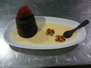 Steamed chocolate pudding, maple anglaise, toffee strawberry and walnuts