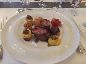 Veal medallion Gamay jus, stuffed vegetables and mushroom filled potatoes.