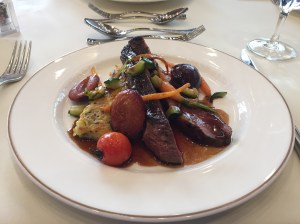 Roast duck breast, roesti and seasonal vegetables