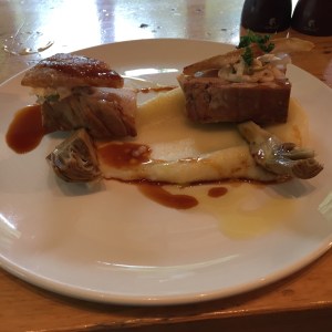 Pressed crispy skin pork belly, daikon, green apple and seeded mustard remoulade, soft potato, artichoke and crispy flat parsley