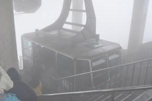 Cable car arriving at the top, Mt Komagatake, clouds rolled through the building